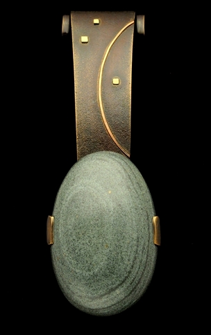 Rock and metal door knocker